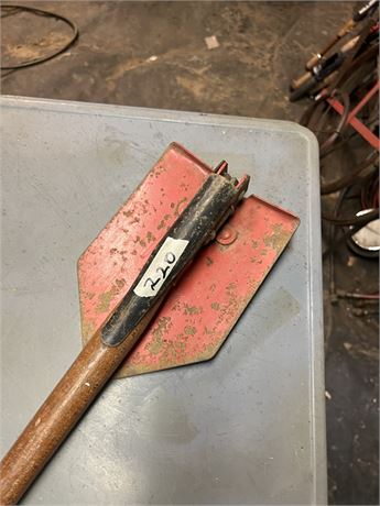 Trench shovel.
