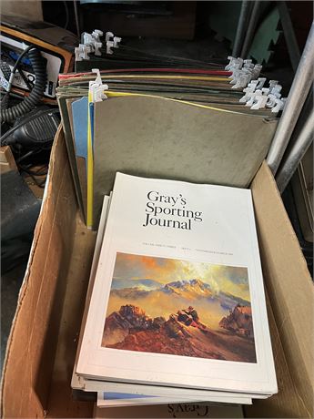 Office supplies, Grays sporting magazines.