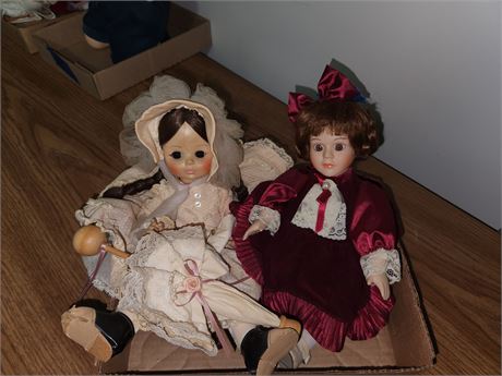 2 porcelion dolls'