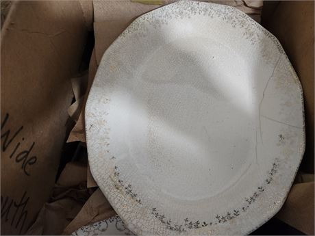 8 Plates and Bowls, 8 Saucers, 3 cups, serving plate