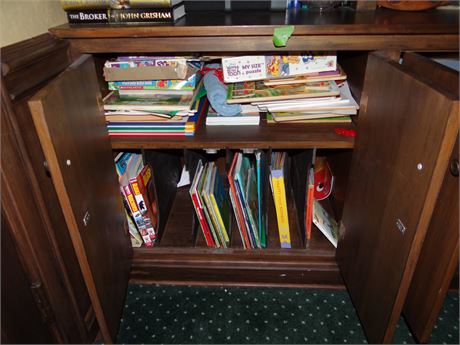 Games and Childrens Books in 3 Front Base Cabinets Library
