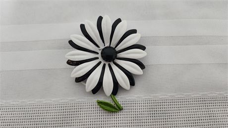 Black and white enamel brooch