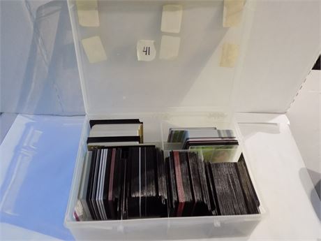 Collectible Pokemon Trading Cards in Sleeves and Plastic Container