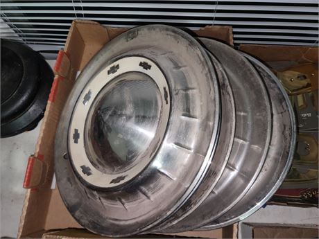 6 Chevy Hubcaps