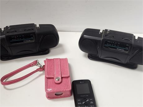 2 small radios and a phone