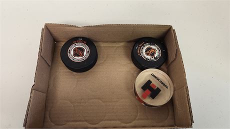 3 Hockey Pucks