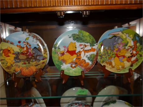 Winny the Poo Collector Plates- Most have Styrofoam boxes