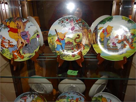 Winny the Poo Collector Plates- Most have Styrofoam boxes