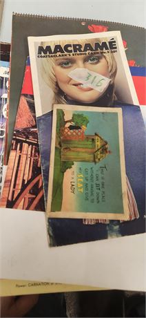 Books, magazines and a postcard
