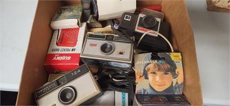 Vintage cameras and pocket radio
