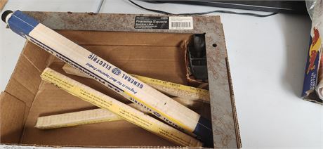 Framing square, plane, and small florescent bulbs