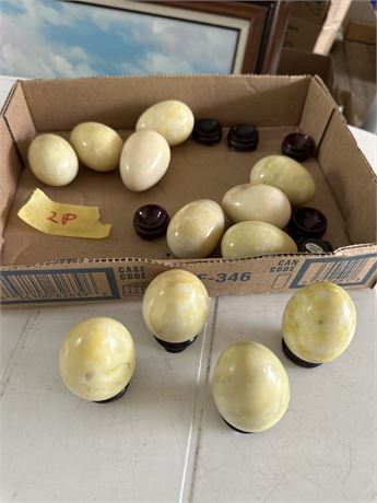 12 alabaster eggs with stands
