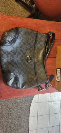 Coach Purse zipper torn