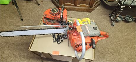 Pair of Homelite Chainsaws. 1 has Compression 1 missing pull cord
