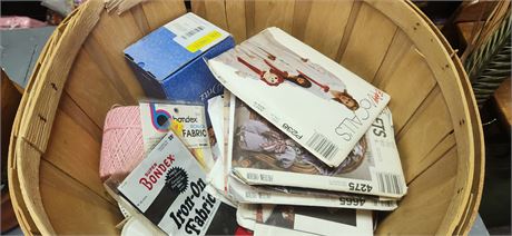 Large Basket full of Sewing Patterns and Supplies