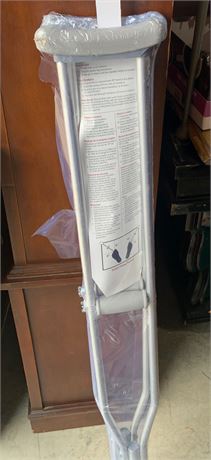 Set Of Silver Crutches With Gray Padded Arms and Hand Grips Never Used