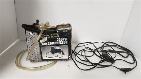 Champion Mini Air Compressor 200. NOT TESTED