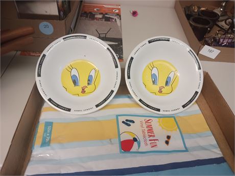 Pair of bowls and a tablecloth