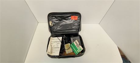 Small travel case with electronics