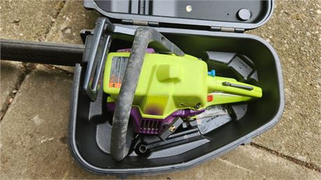 Poulin Chainsaw With Case. NOT TESTED