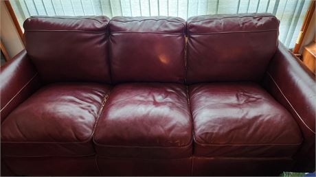 Red Leather Couch.