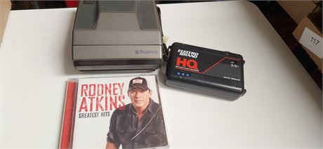 Polaroid Camera & CD & Handheld AM/FM Receiver