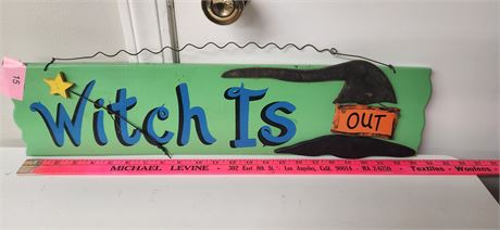 Wooden witch sign