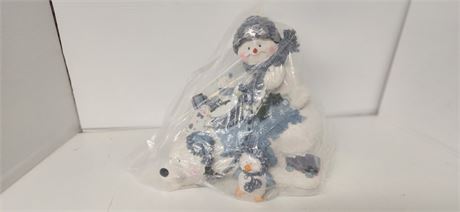 Lying Polar Bear With Snowman On Back