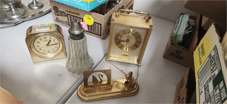 Brass paperweight and clock
