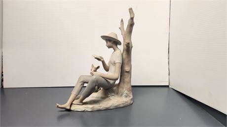 Duncan Royale Boy Sitting With His Dog Statue