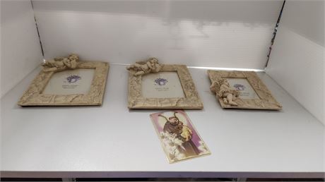 3 Picture Frames & Heart Necklace