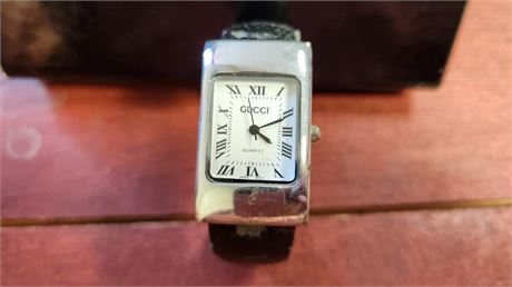 Metal Cuff Vintage Watch. Marked Gucci. NOT TESTED And DONT KNOW IF REAL OR FAKE