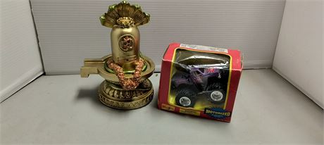 Hindu God Statue & Small Toy Monster Truck