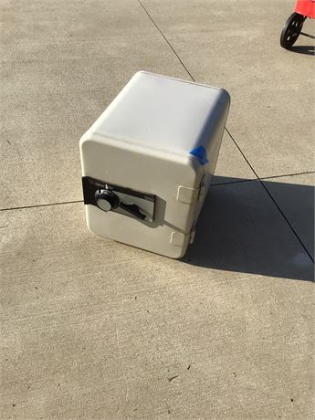 Sentry Safe weighs 64 pounds with Combination