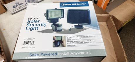Solar powered security light