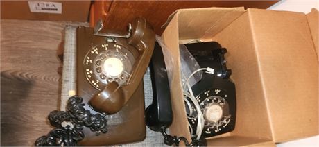 2 vintage telephones and a heater