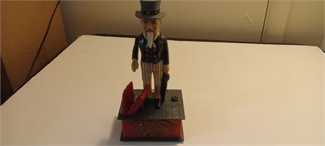 Cast Iron Stamp Dispenser & Cast Iron Uncle Sam Bank