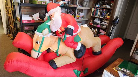 Inflatable Rocking Santa. Has Been Repaired With Tape Multiple Times.
