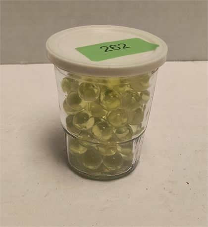 Jar Of Collectible Marbles. Marbles Glow Under Black Light