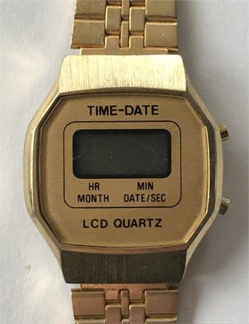 Time-Date by Delta Impex Corp. LCD Quartz Watch