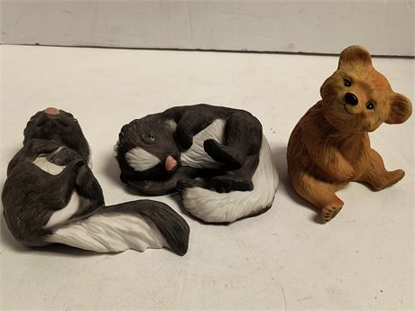 The Snuggle Babies Skunks & Bear Sculpture Collection Figurines