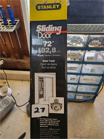 Steel track for a sliding door