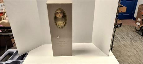 Mann's Collectible Musical Doll