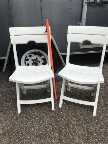 2 Plastic Folding Chairs