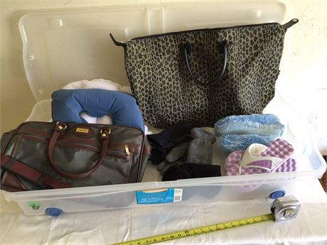 Tote with assorted travel bags, gloves, and slippers
