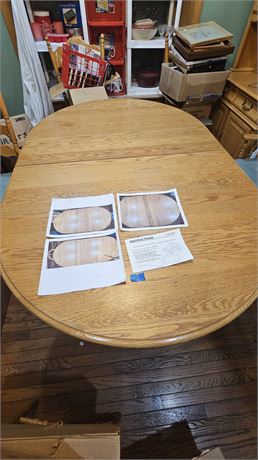 Solid wood dining table and chairs (has extra leaves)