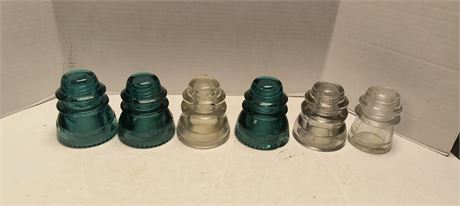 Various Glass Insulators. Wear And Some Chips In Some Of Them