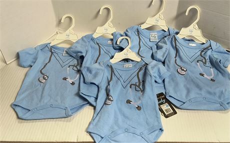 Mon Cheri Baby Onesies. Size 6-9 Months
